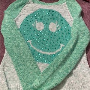 Blue knitted sweater